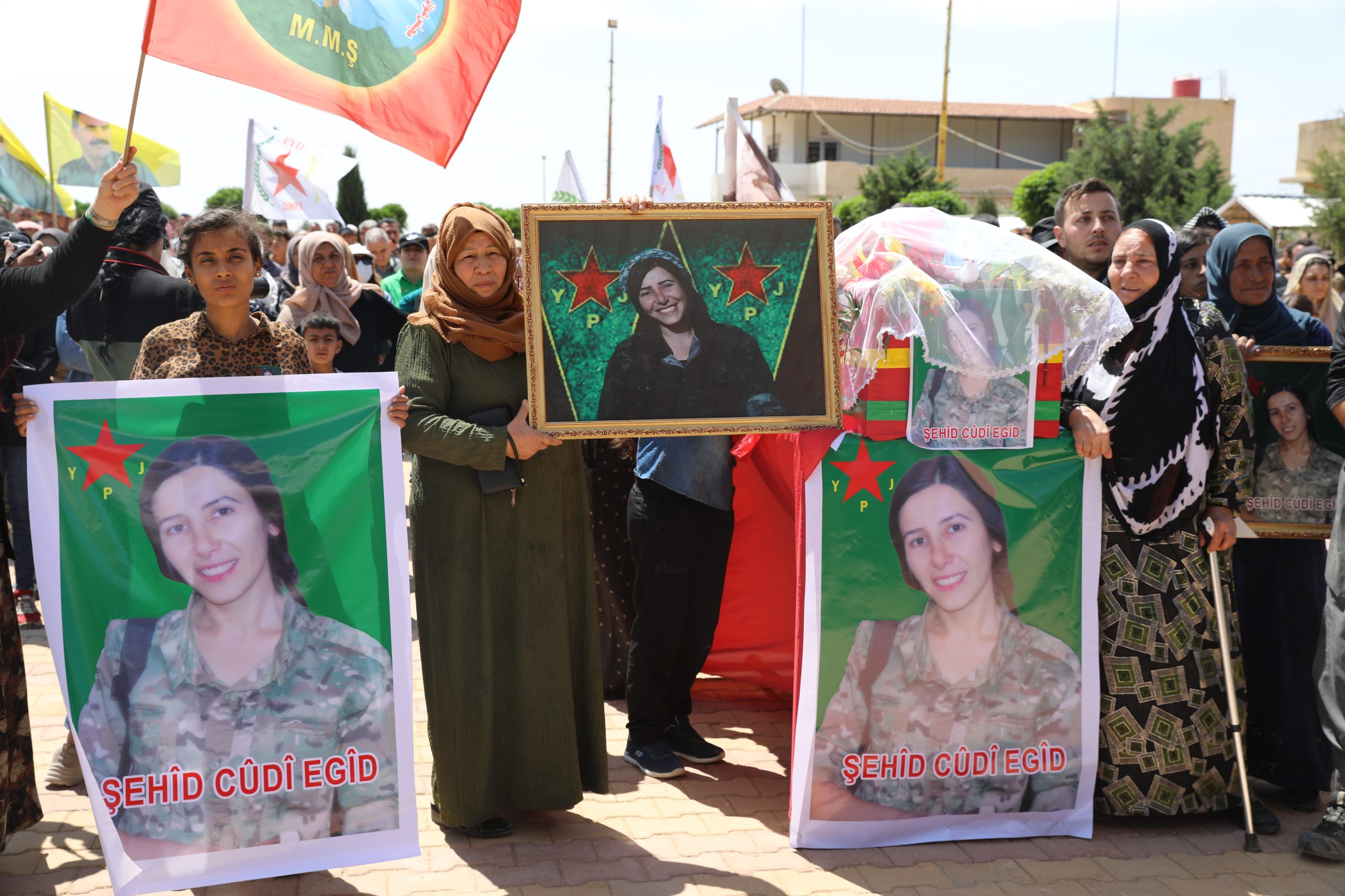 The people of Al-Hasakah city mourn the body of the martyr Judy Egid to her final resting place
