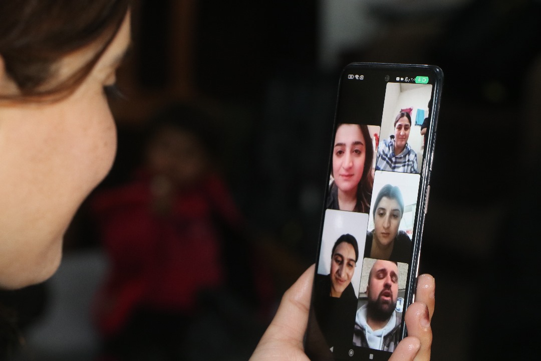 The moment the Yazidi woman Kofan speaks to her family on the phone