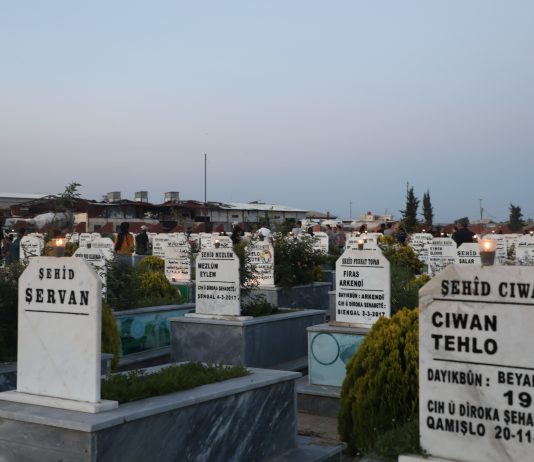 On the Eve of Eid al-Adha, Candles Are Lit at the Graves of the Martyrs at the Martyr Delil Saroukhan Shrine in the City of Qamishlo