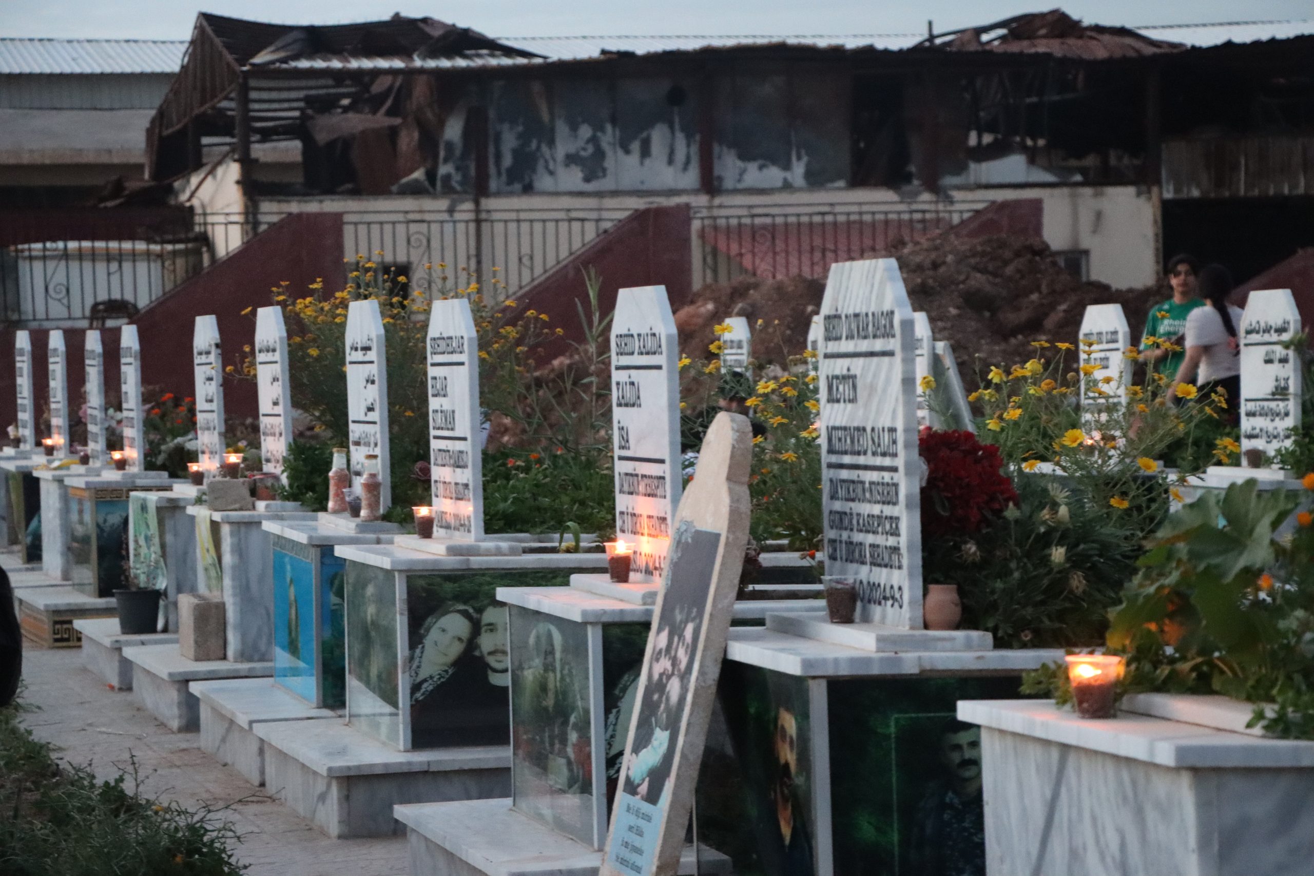 Candles Lit at the Graves of Martyrs on the Occasion of Kurdish Language Day