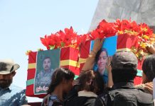 In Kobanê: A Solemn Funeral Ceremony for Two Martyrs at Martyr Dicle Cemetery