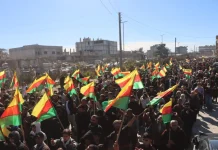 Bi hezaran şêniyên Kobanê ji bo parastina destkeftiyên şoreşê meşiyan